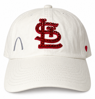 White baseball hat with St. Louis Cardinals STL logo in red crystals with silver grey embroidered St. Louis Arch decal on the side