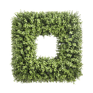 Square boxwood wreath featuring dense, lush green foliage in varying shades of green on a white background.