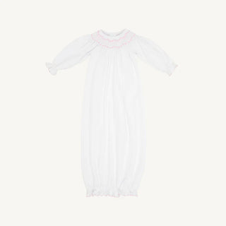 Pink smocked baby greeting gown by The Beaufort Bonnet Company