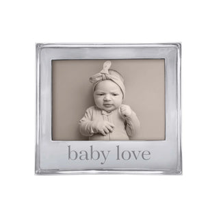 silver frame for 5x7 photo that  is engraved "baby love" on bottom
